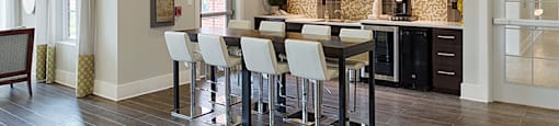 Clubhouse with bar area; flat screen TV; tables and chairs