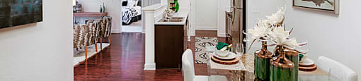 Dining room next to entryway and front door; open to kitchen
