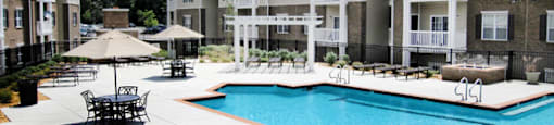 Resort-style pool with Chaise Lounges