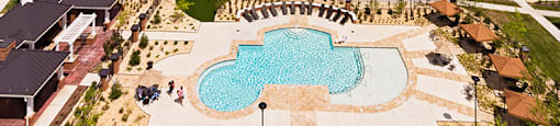 Aerial view of community clubhouse and pool