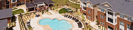 Aerial view of community clubhouse and pool