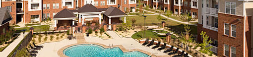 Pool with chairs and sun shelf