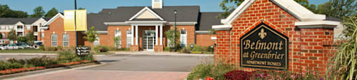 Belmont at Greenbrier community entrance with sign; clubhouse