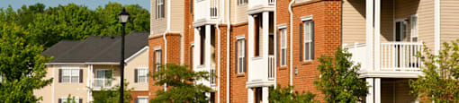 Apartment buildings with patio or balcony