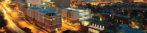 Belmont at Freemason apartments in downtown Norfolk; nighttime view overlooking the city lights