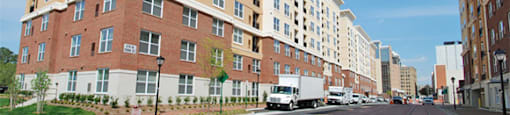 Belmont at Freemason apartment exterior adjacent to light rail tracks