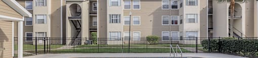 the swimming pool at the preserve at polk apartments