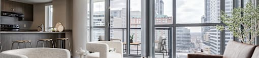 A modern living room with a view of the city.