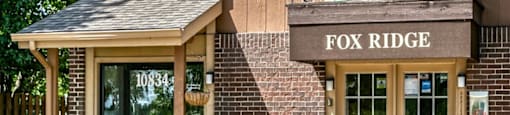 a building with a fox ridge sign on the front of it