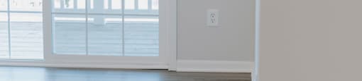 A white door with a glass window and a handle.
