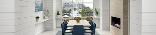 A dining room with a table set for six at The Port at East Beach Apartments and Marina in VA, 23518