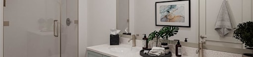 a bathroom with a sink and a shower and a toilet at The Port at East Beach Apartments and Marina, Virginia