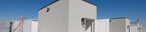a view of the roof of a building with a door