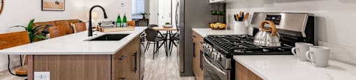 an open kitchen with a dining area