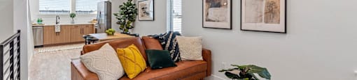 a living room with a couch and a table