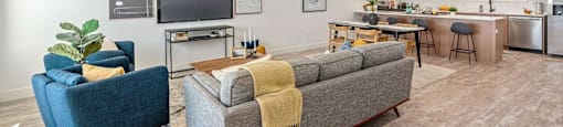 a living room with a couch and a tv