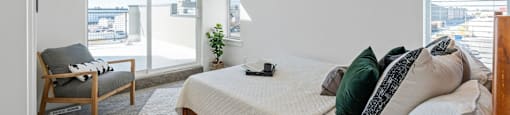bedroom with a bed and windows