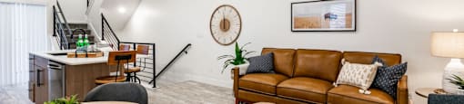a living room with a couch and a table