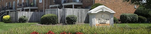 Apartment building, grounds, and community signage