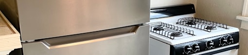 Full-sized appliances including new stainless steel fridge.