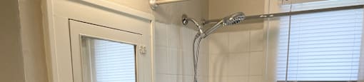 Ceramic tiled bathroom.