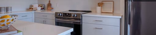 Full kitchen with ample storage at Portland Towers