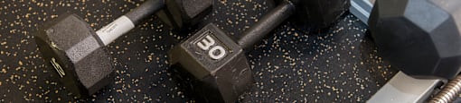 Free weights available in the fitness center at Portland Towers