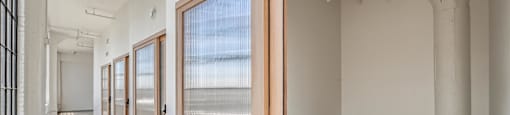 A room with a door and a window.