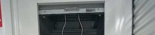 A storage unit with the label A-89 on the door.