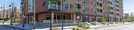 A modern apartment building with the name "ONE VIEW" on the side.