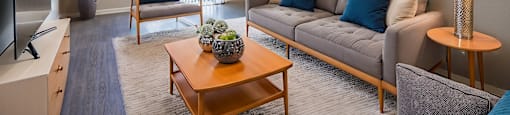 a living room with a couch and a coffee table