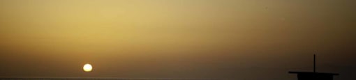 View of the nearby beach at sunset