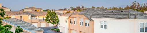 A residential area with houses and driveways.