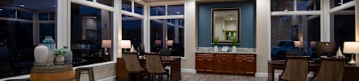 A room with wooden floors and furniture.
