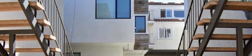 walkway between units with colorful foliage