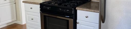 kitchen with appliances and tile backsplash