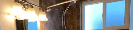 bathroom with tile shower