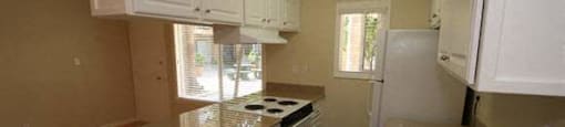 Kitchen, Granite Counters, Appliances, Tile, Wood Flooring