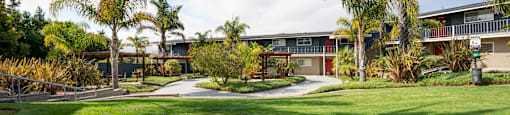 addibuilding iimage with grass area at the Diplomat