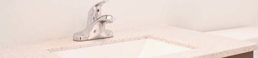Bathroom vanity with in laid sink and mirror