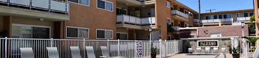 community pool and lounge chairs