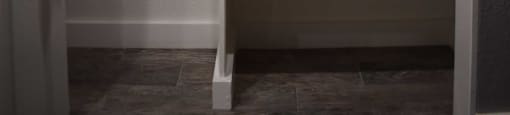 View of bedroom closet with built in shelving and room to hang clothes