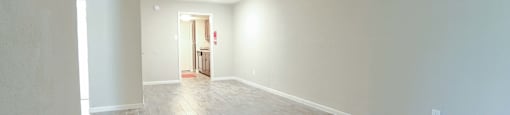 Living room area with wood floors