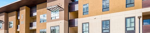 Apartment complex with balconies and garage at Solace at Ballpark Village, Arizona  , 85338