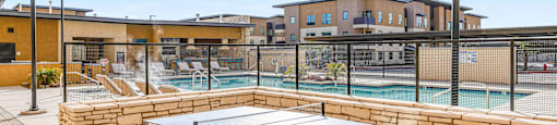 Outdoor game area with ping pong table at Solace at Ballpark Village, Goodyear, AZ, 85338