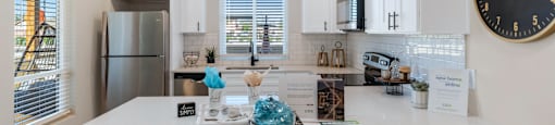 Kitchen with a quartz counter top at Solace at Ballpark Village, Goodyear
