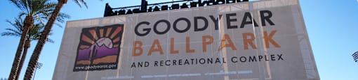 Property banner in front of a baseball field at Solace at Ballpark Village, Goodyear, 85338