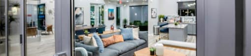 a living room with a couch and a table at Inspiration Apartments, Arizona
