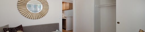 a living room with a couch and a door to a bathroom