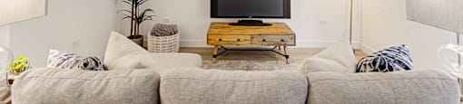Living Room With TV at Winfield Station Apartments, J Street Property Services, Winfield, IL